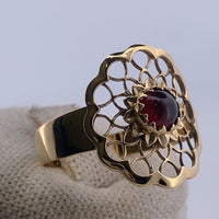Bague marguerite pierre grenat or jaune 2,37 g