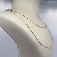 Collier double chaine avec perles or jaune 1,32 g