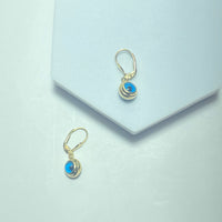 Boucles d'oreille oeil bleu 2.64 g