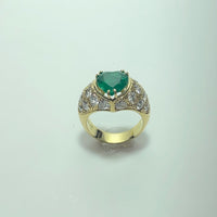 Bague or 18 carats emeraude et diamants 9.72 g